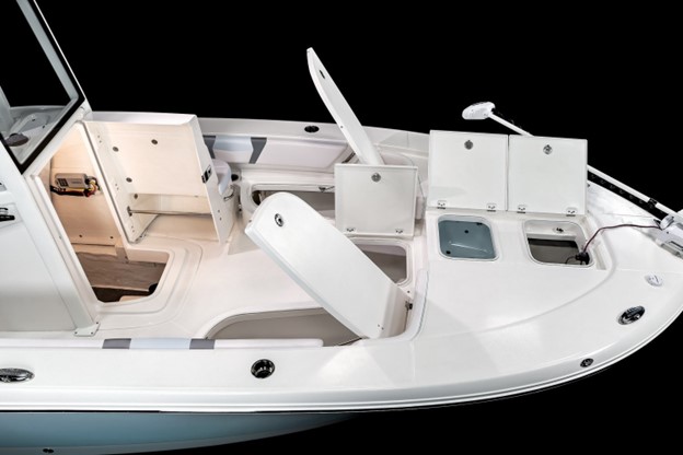 Robalo 246 Cayman two forward hatches reveal another livewell and the anchor locker