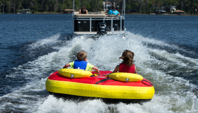 Kids tubing on the water