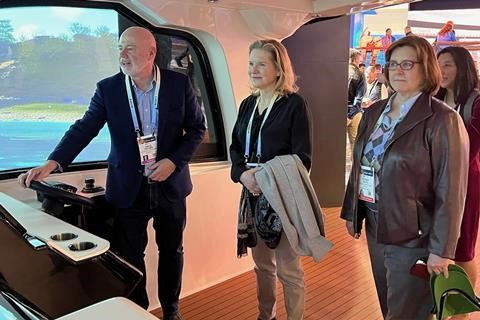 Brunswick CEO David Foulkes demonstrates the firm’s boating simulator