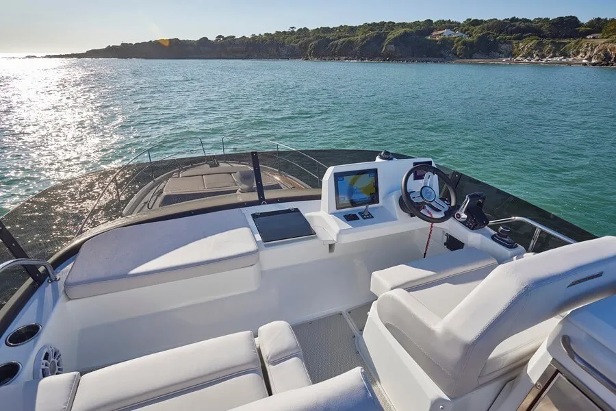 Beneteau's Antares 12 the backrest for the companion seating to port can fold down to a create a sunpad