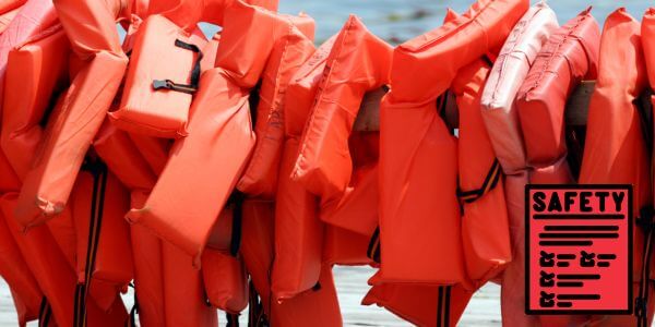 Lifejackets hanging on a pole