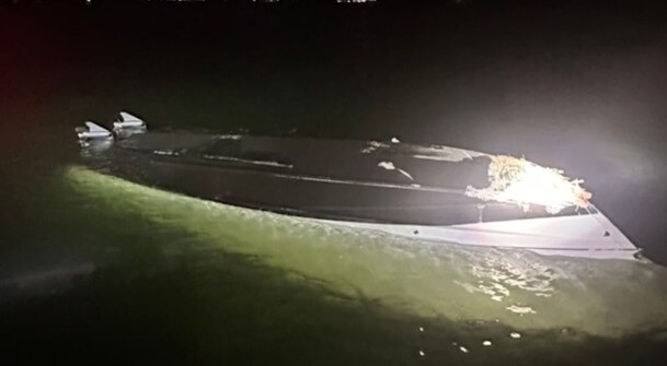 A boat eventually sank after hitting a break wall, leaving two people with ‘significant injuries’