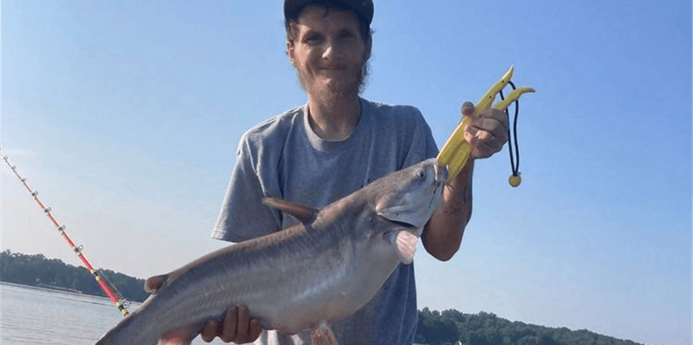 A man holding a fish