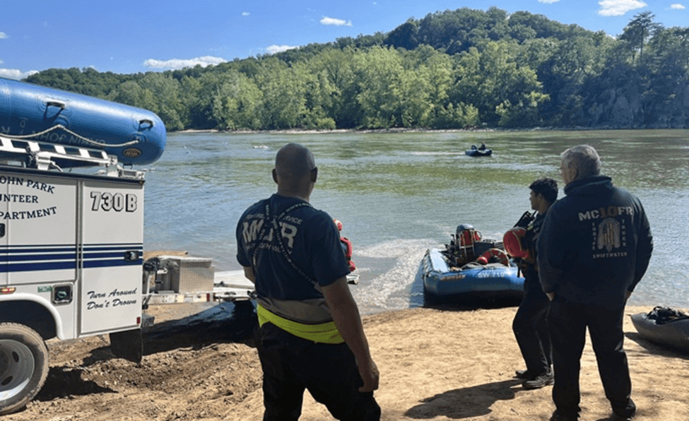 First responders helping kayakers
