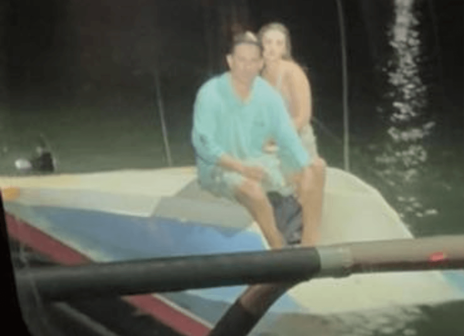 Picture of a couple sitting on a boat