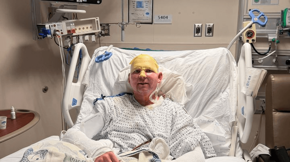A man in a hospital bed