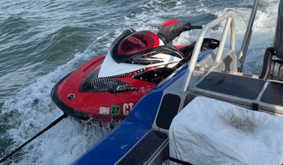 Jet Ski being towed by boat