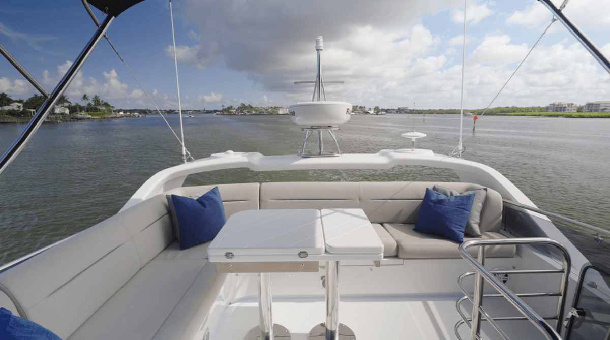 Aft L-Shaped Seating. Note the radar support folds down to reduce air draft