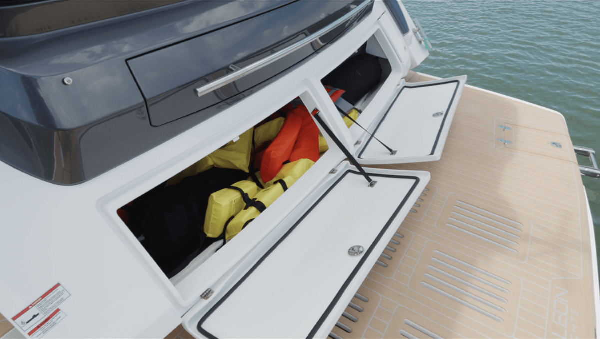 Stern stowage. Note retractable grill above stowage lockers.