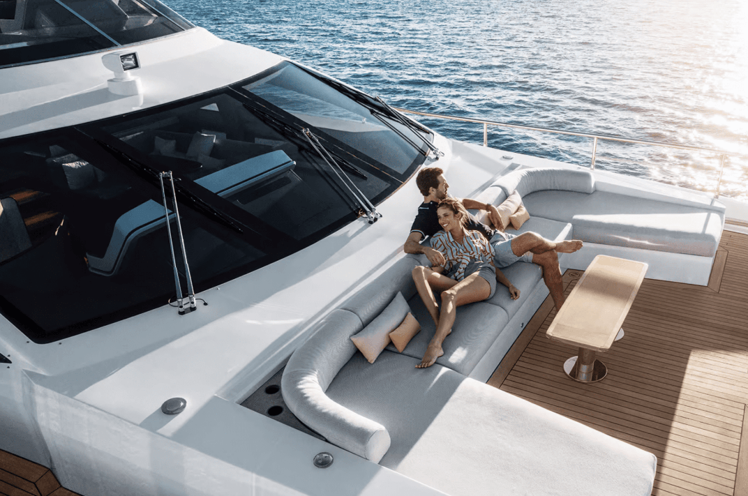 couple enjoying time on the deck of a yacht