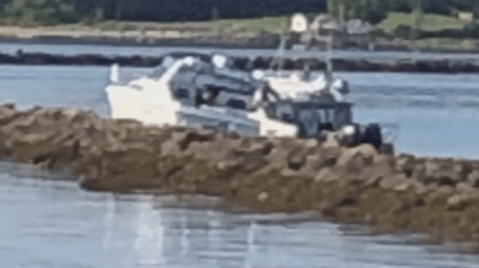 Boat crashed into rocks