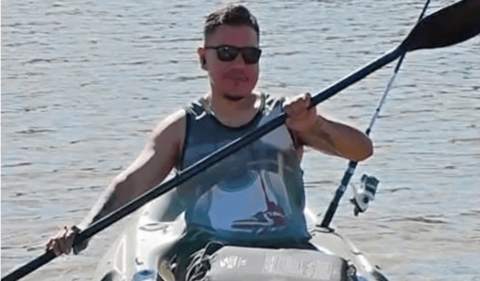 A man Kayaking