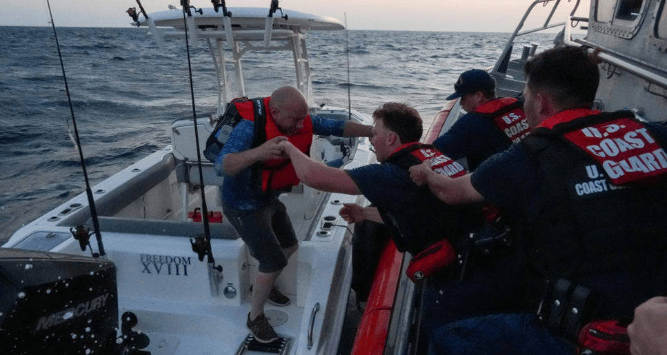 Two People being rescued
