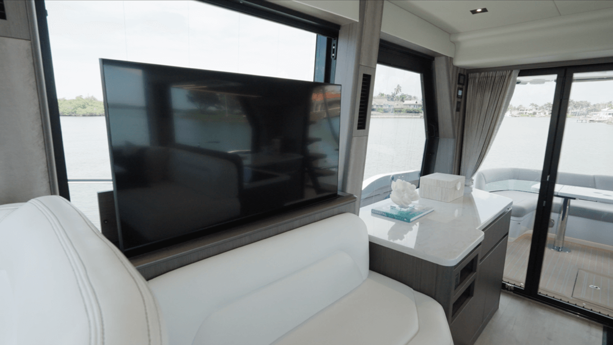 Starboard bench seating with retractable TV