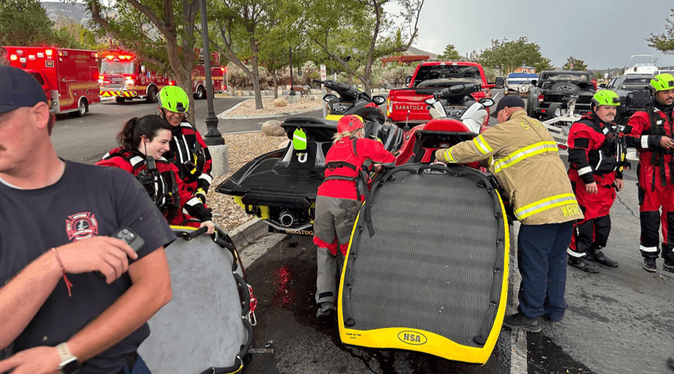 Rescue Crew helping Paddle boarders
