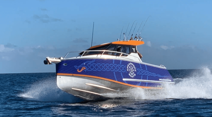 Dreadnort Boats D7500 running on water
