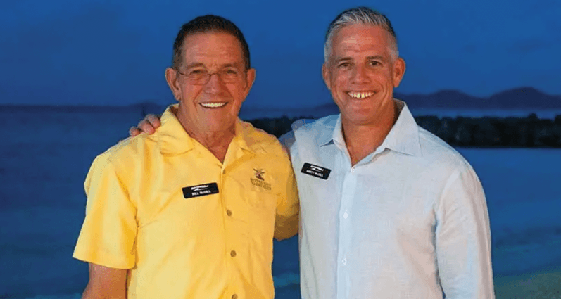 Bill McGill original CEO of MarineMax, and his son, Brett, current CEO