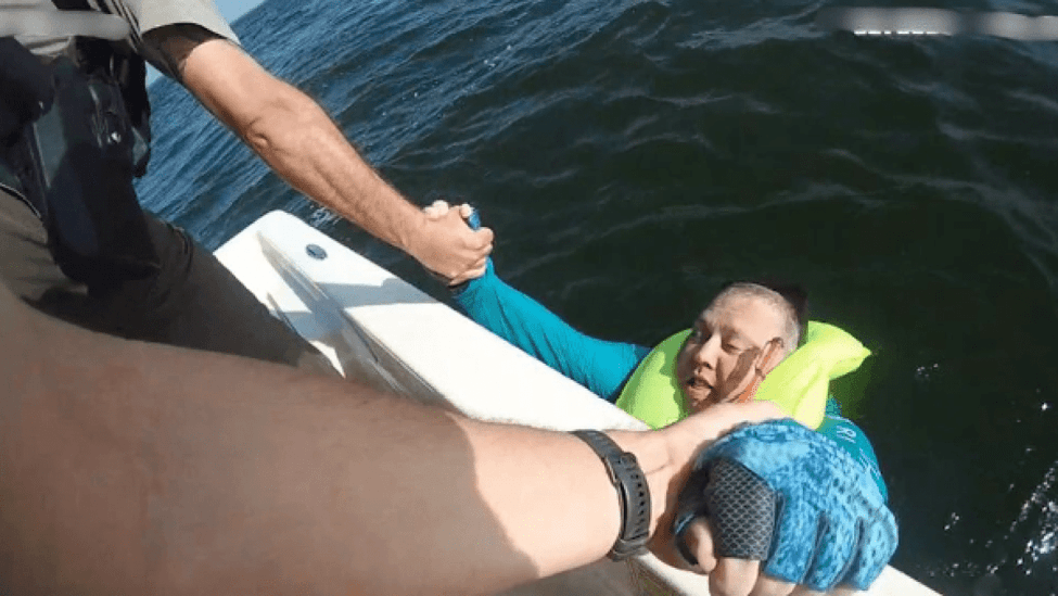Woman getting on a boat