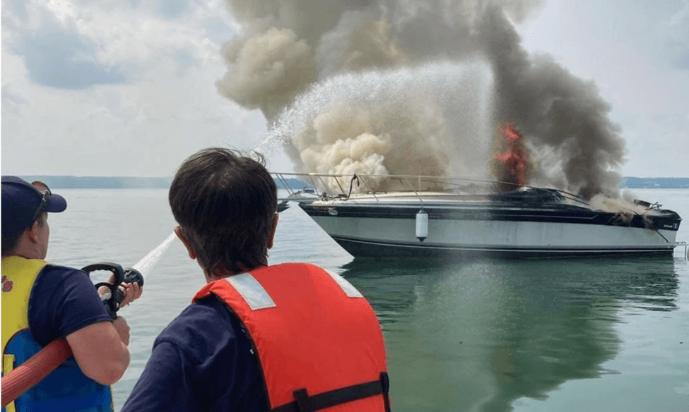Crew putting out a boat fire