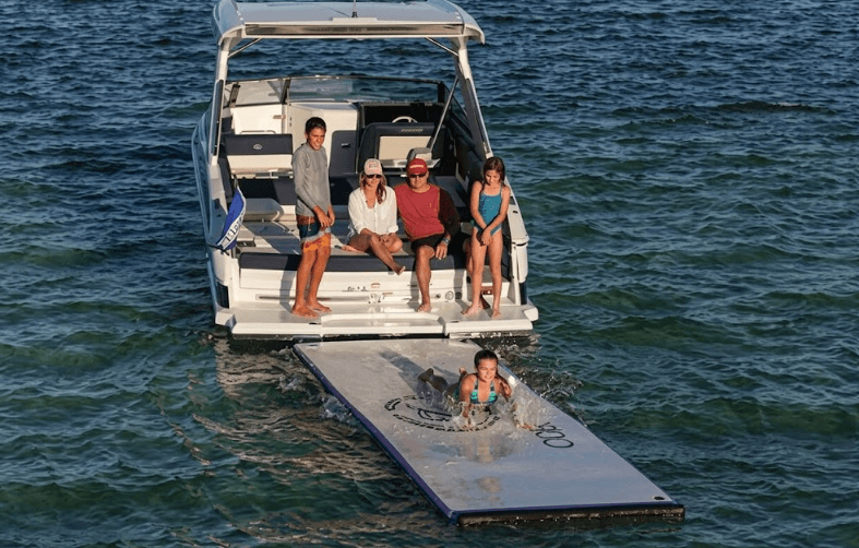 kids playing on boat in water