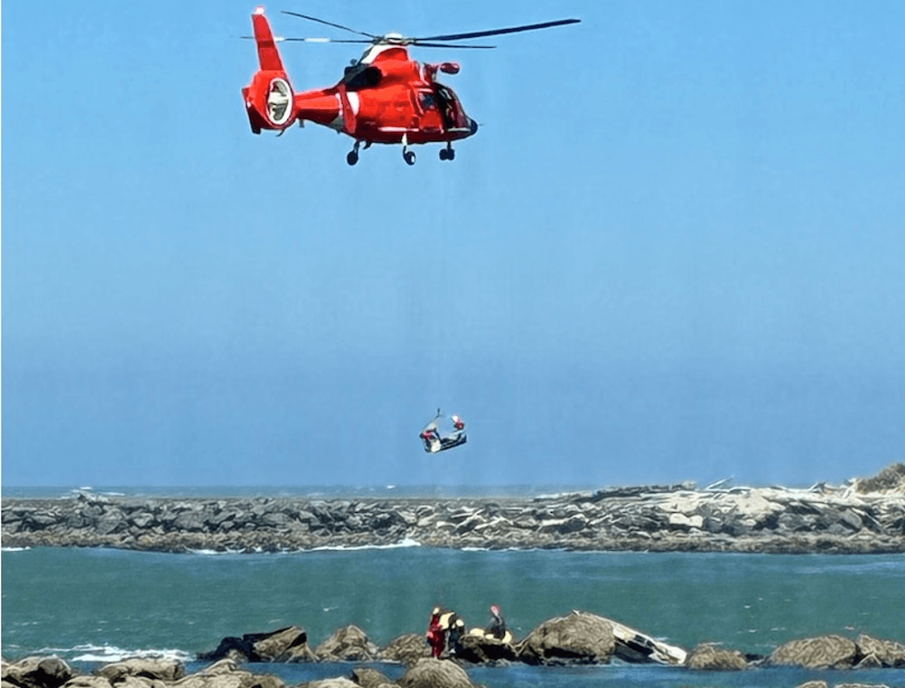 Helicopter rescuing people