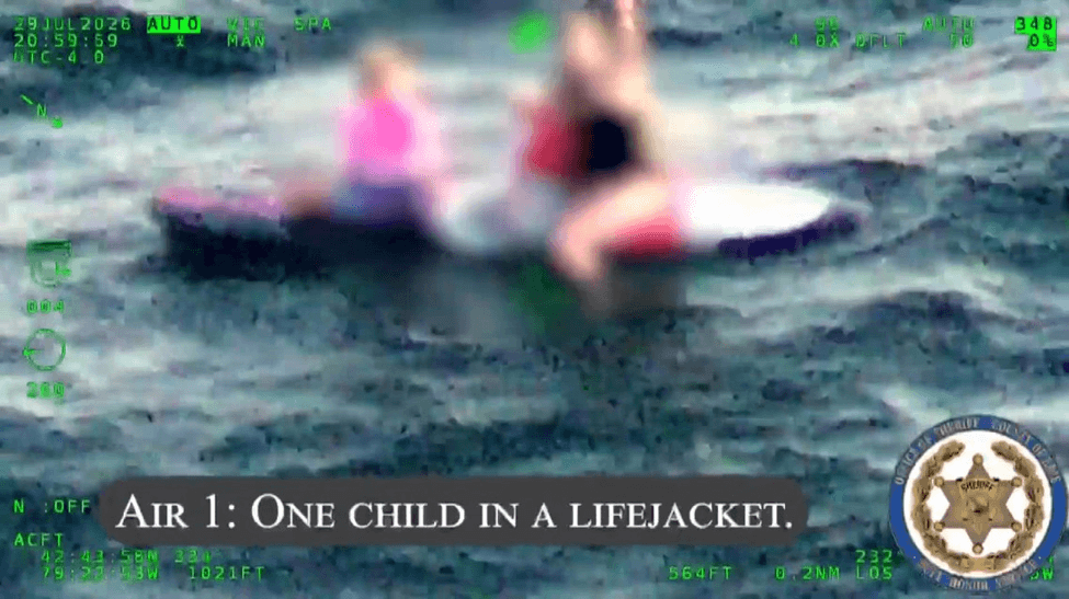 Blurry pic of mother on a lake