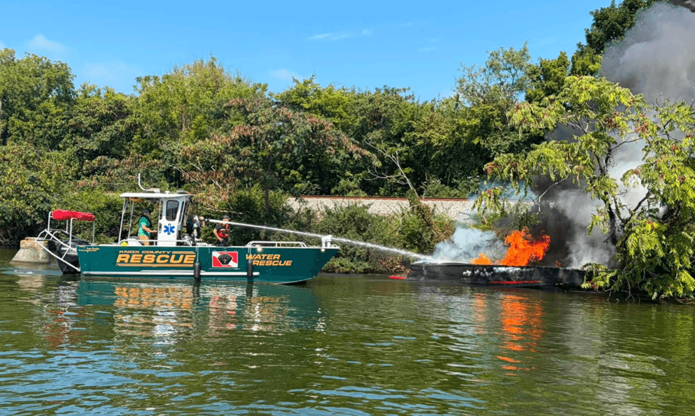 Boat Fire getting extinguished