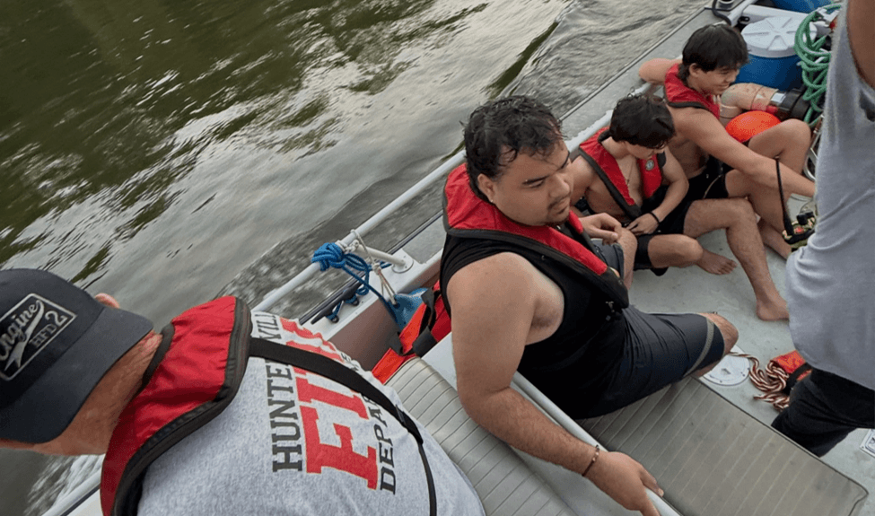 People being rescued in a boat