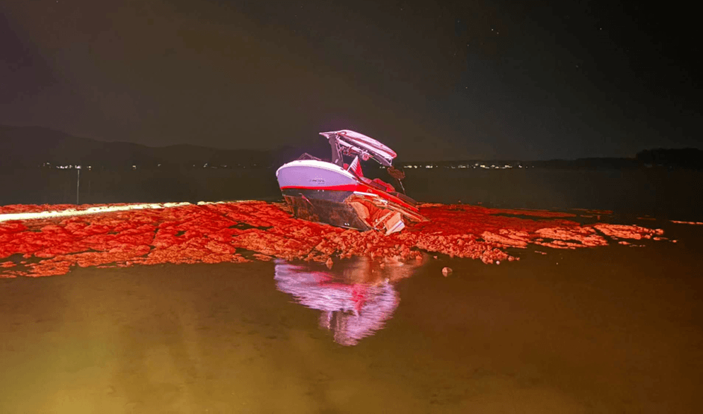 A grounded boat in a lake