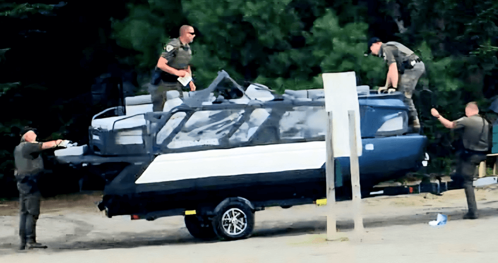 Men inspecting crashed boat