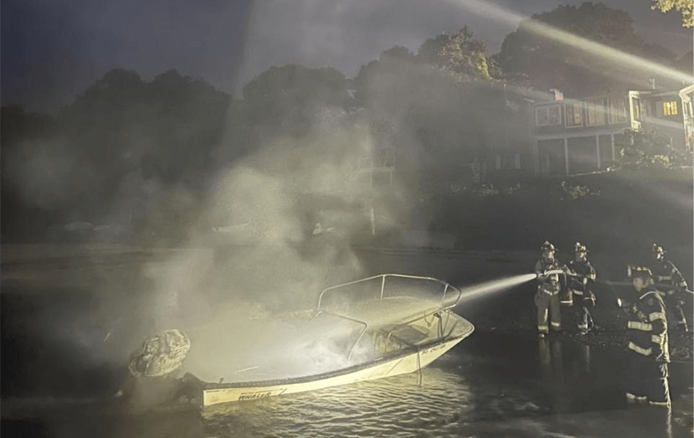 Rescue extinguishing fire in a boat