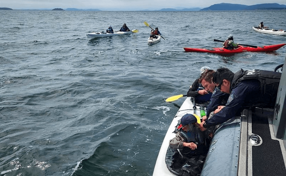 Kayakers in rough waters
