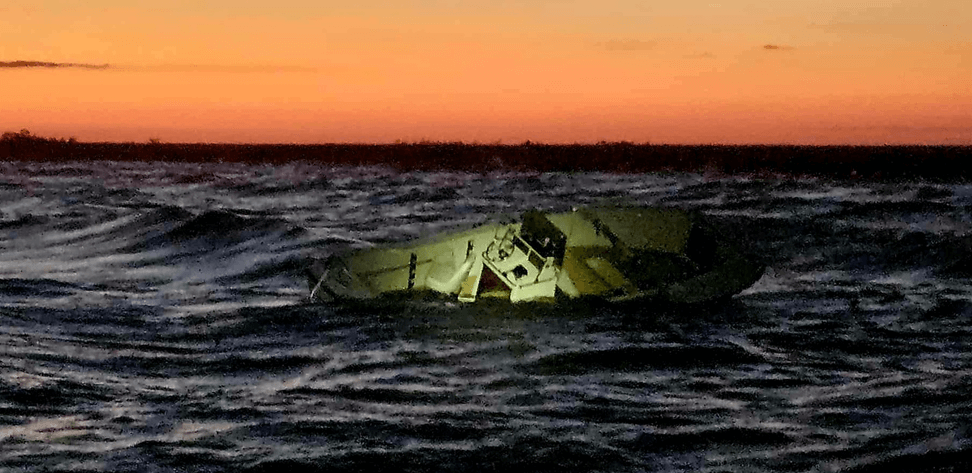 Boat sinking in water