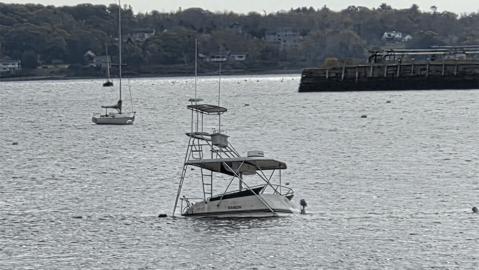 A sunken vessel in the water