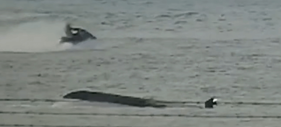 Capsized Boat in water.