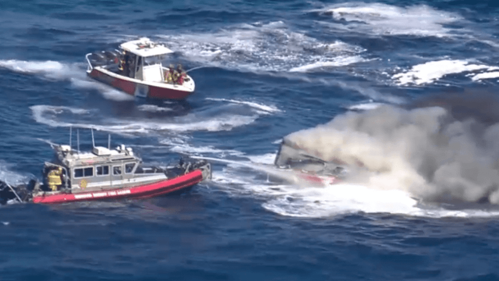 Boat on Fire in Ocean