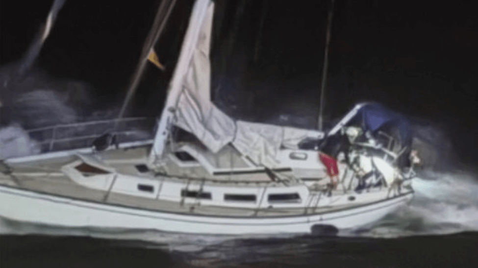 Sailboat drifting in the water