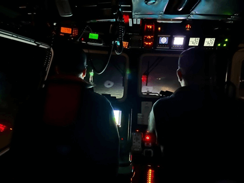 Two men in a helicopter