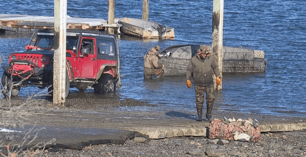 Jeep pulling in a boat 