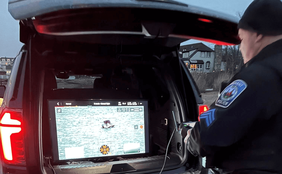 Man using a Drone to locate Boat