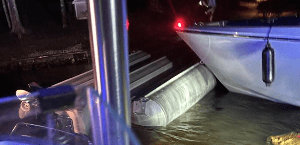 A capsized pontoon was pushed to shore by a sheriff’s boat after a 4-year-old was found trapped 