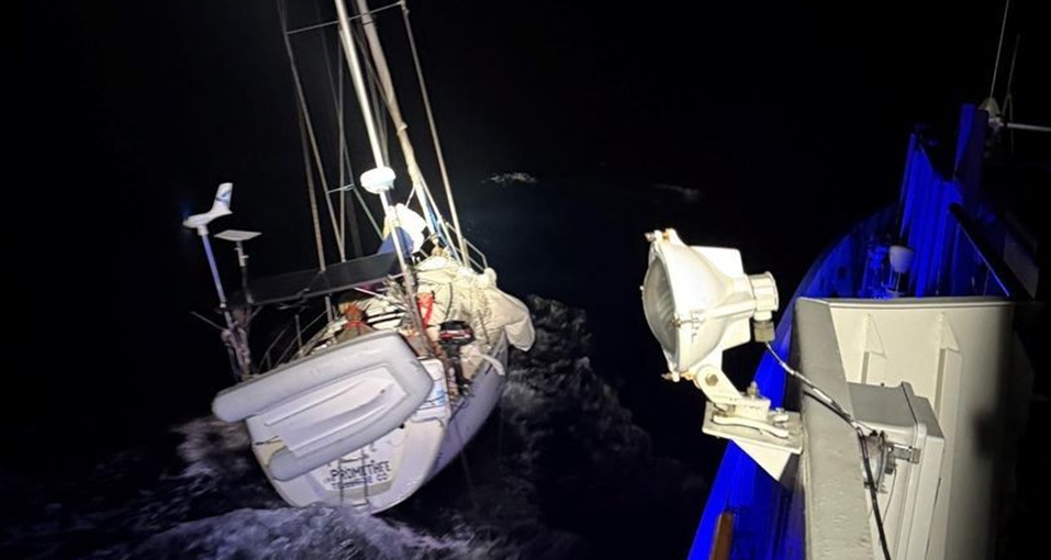 Disabled sailboat in the water