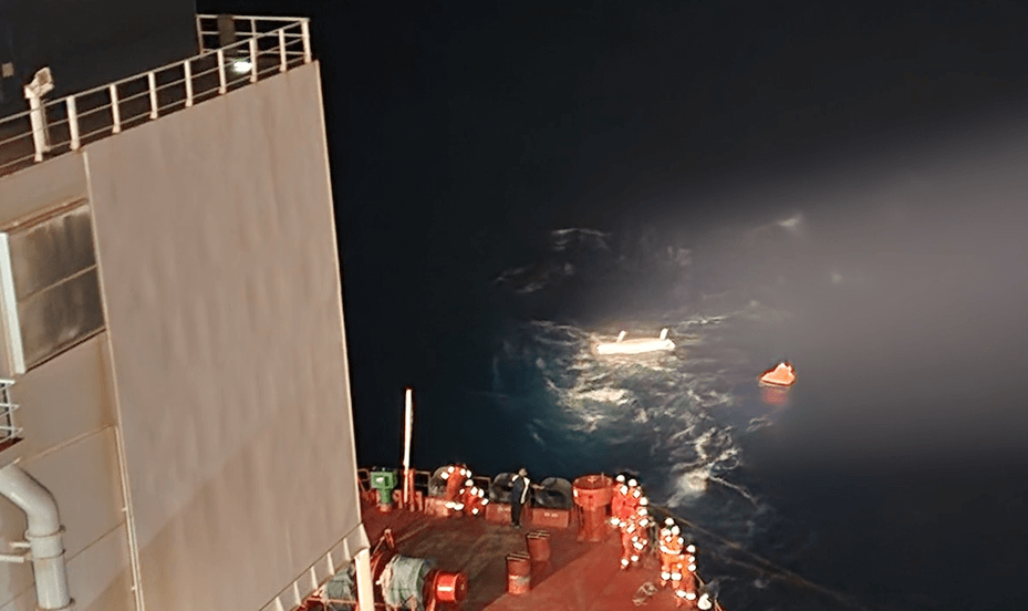 Capsized rower in the ocean