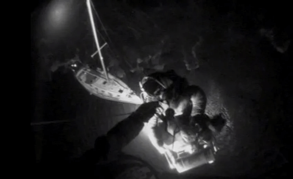 Man being lifted to safety