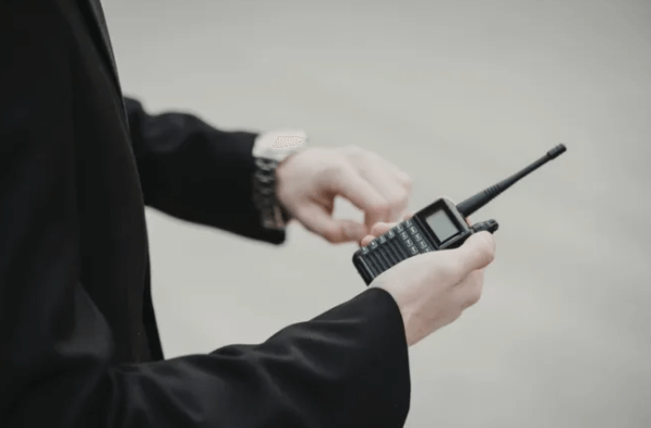 Person holding radio