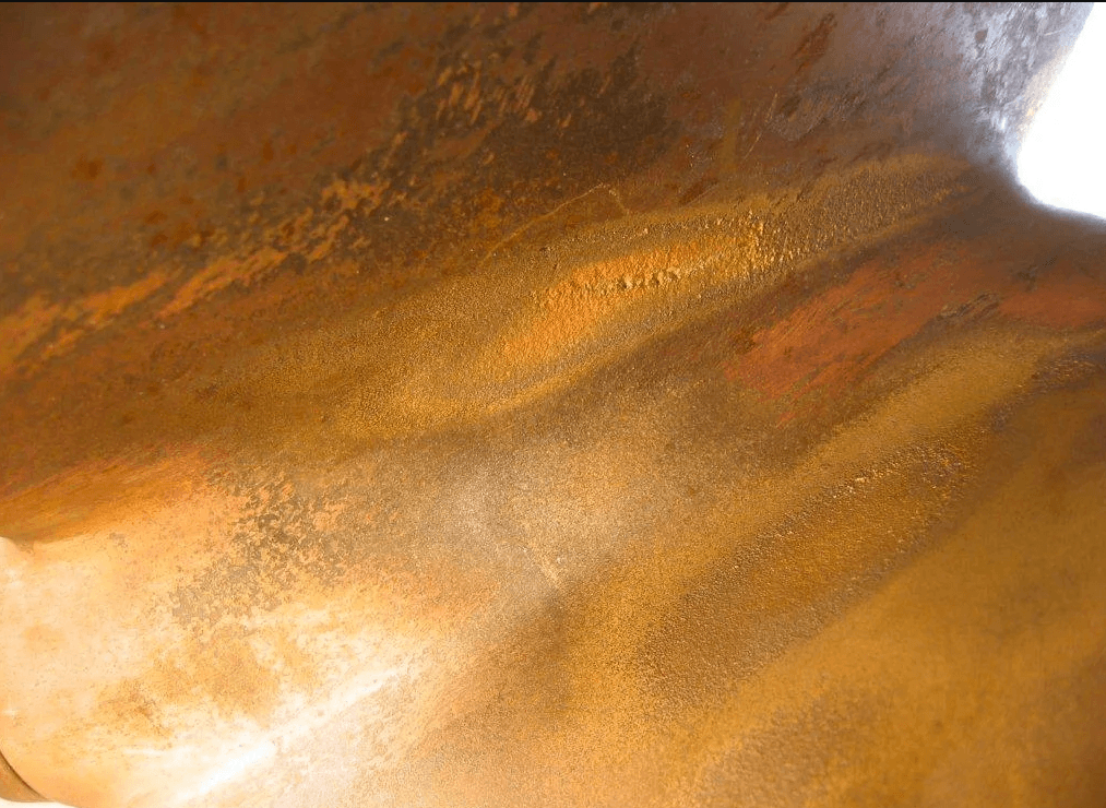 Rust pits in boat metal