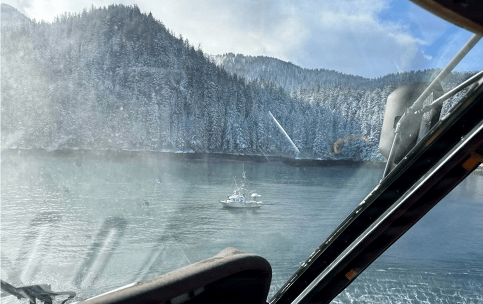 Helicopter looking for missing boat