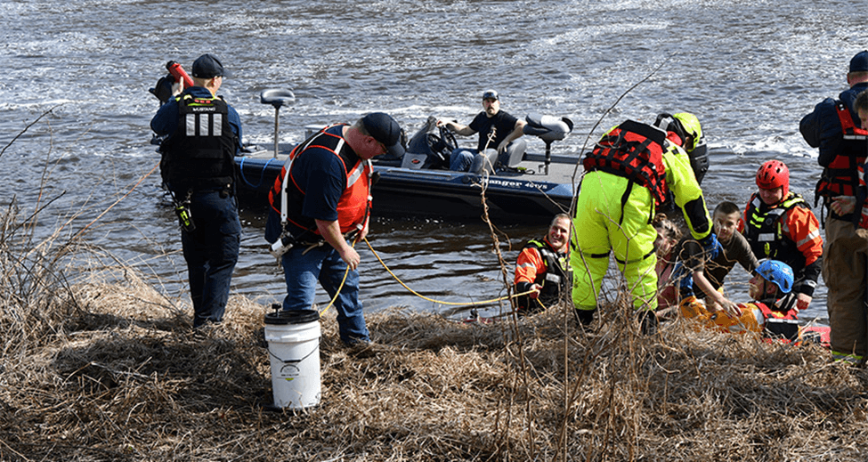 Kayakers being rescued