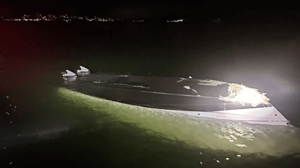 A boat eventually sank after hitting a break wall, leaving two people with ‘significant injuries’