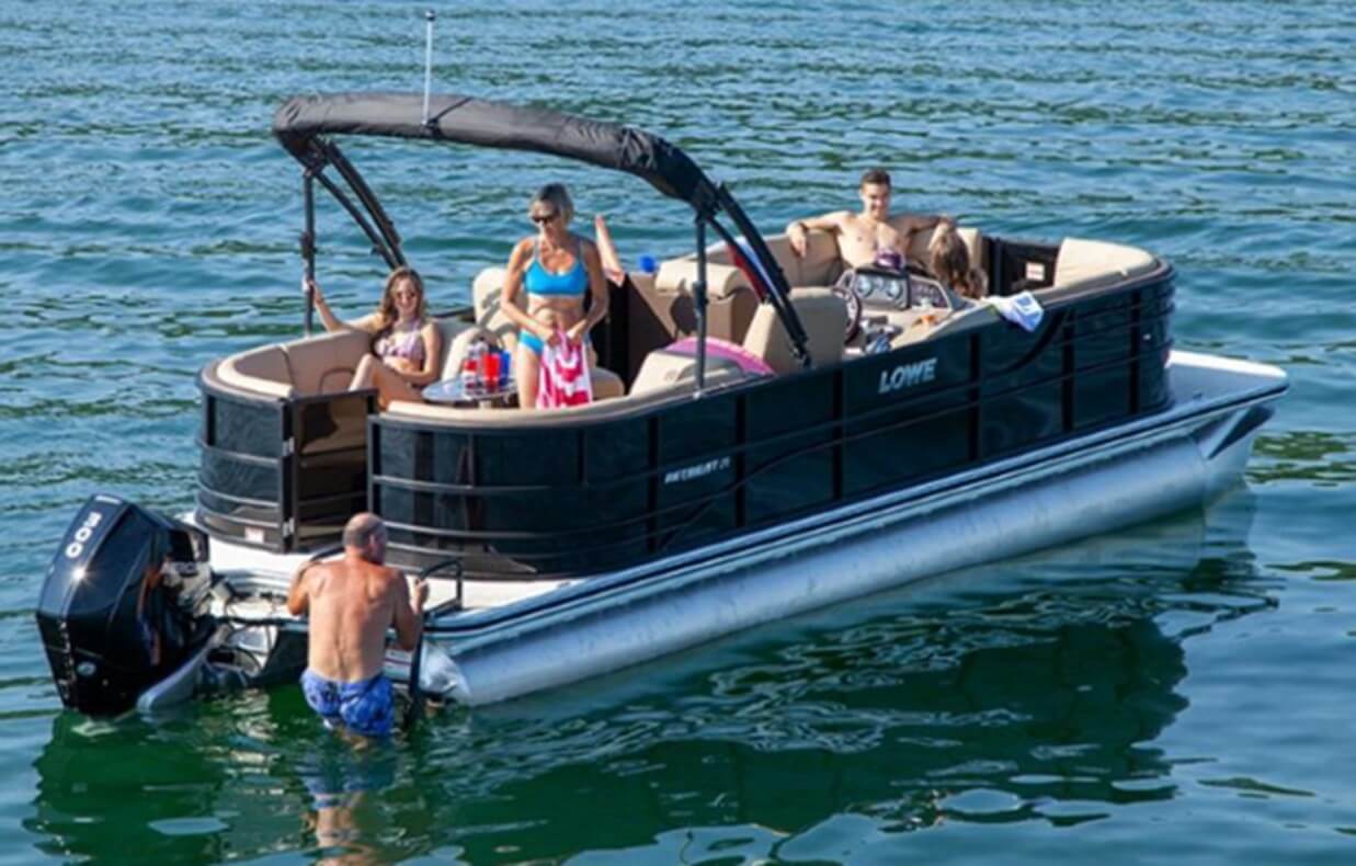 Family enjoying the water on a pontoon boat
